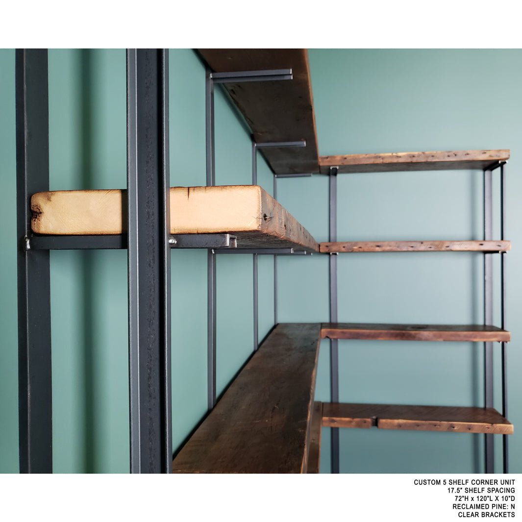 wall mounted corner bookshelf handmade in USA with heavy duty solid steel shelf brackets and 1.5" reclaimed pine wood shelves. Floating bookcase on green wall with solid metal shelf brackets. 5 tier shelving unit by Vault Furniture