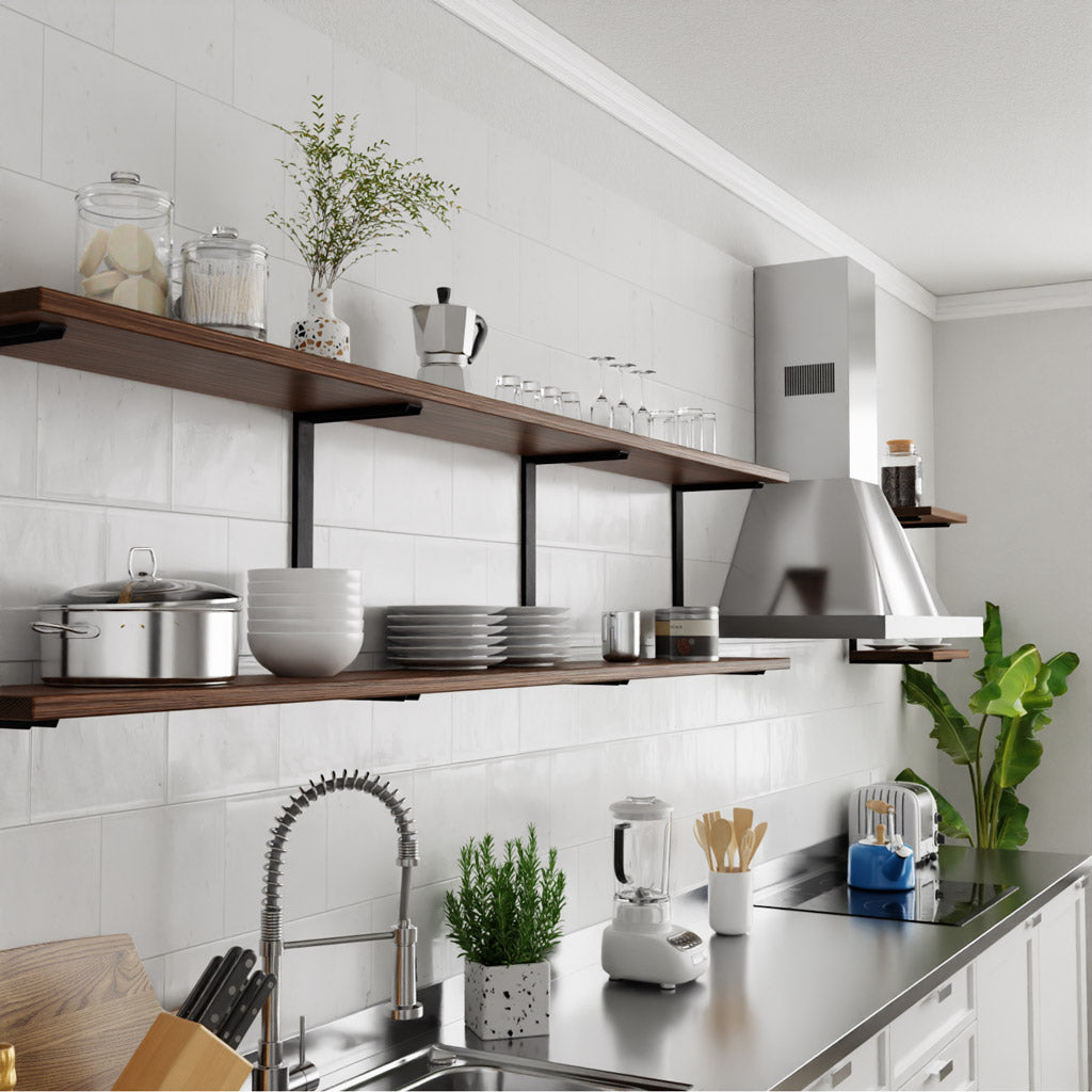 Modern kitchen with open shelving. white tile kitchen wall with blackwalnut wood shelving with heavy-duty black metal shelf brackets. stainless steel hood vent industrial kitchen. shelves by vault furniture
