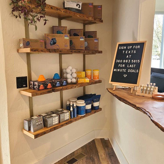 rustic spa shelving reclaimed wood with brass brackets