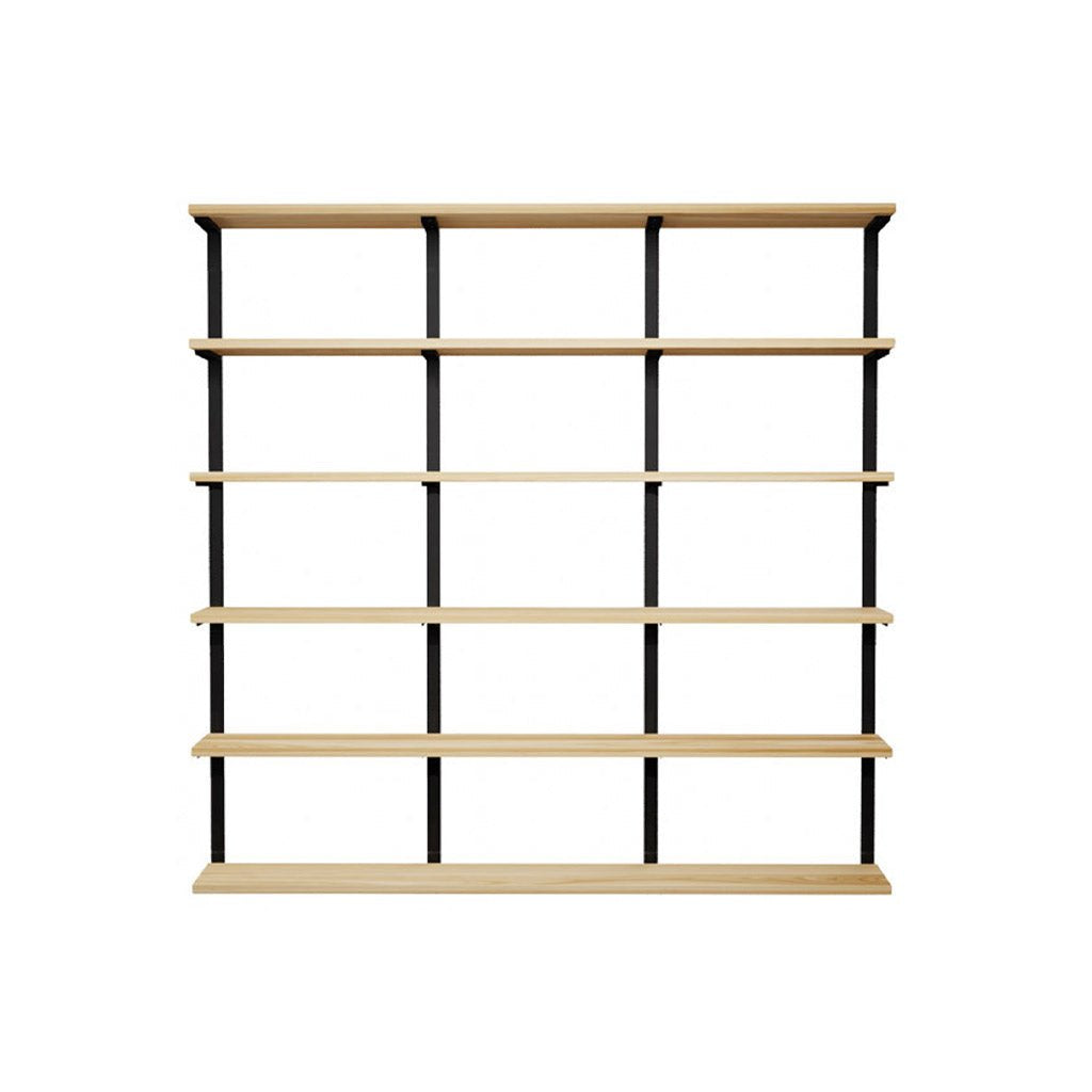wall mounted shelving unit. tall shelving unit with black walnut shelves and solid steel black floating shelf brackets.