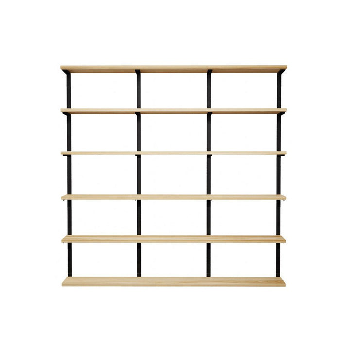 wall mounted shelving unit. tall shelving unit with black walnut shelves and solid steel black floating shelf brackets.