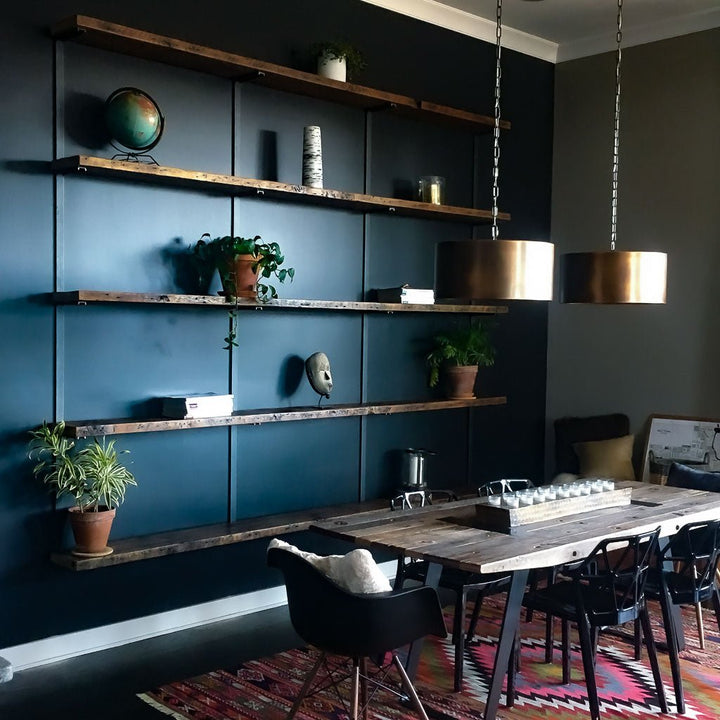 Large wall shelves in reclaimed pine and steel brackets by Vault Furniture