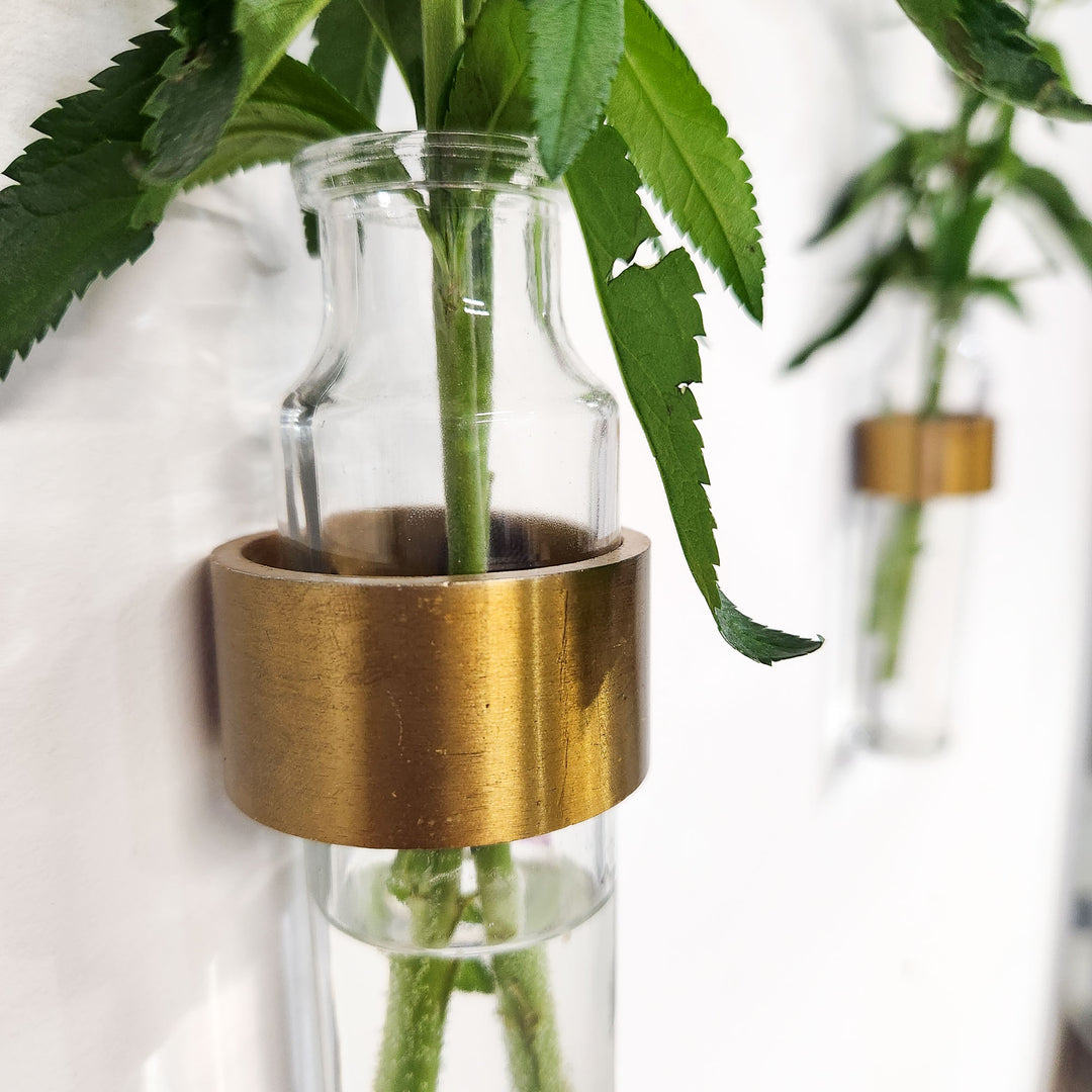 Antique brass vase for hanging plants on wall. Vault Furniture