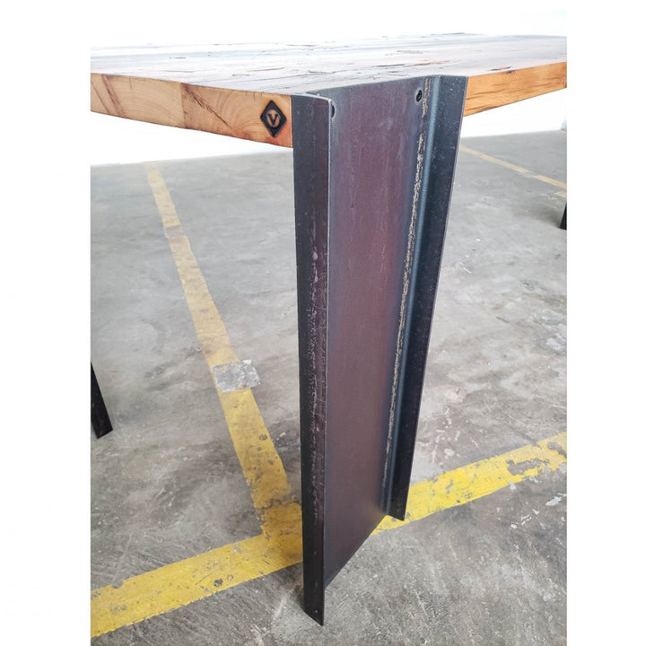 Handmade American reclaimed pine dining table with steel legs. Modern, industrial, sleek, minimalist design. Wood and metal dining room table.