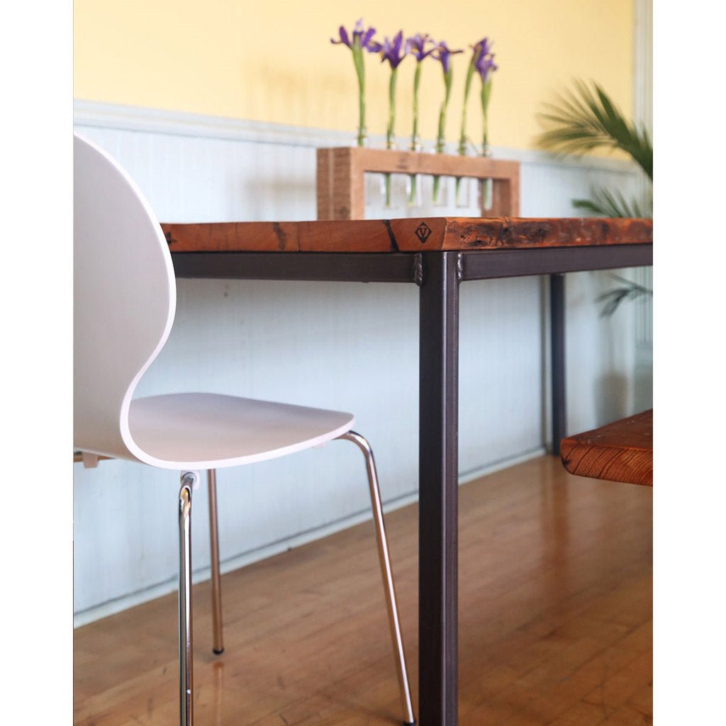 Reclaimed wood and steel dining table by Vault Furniture