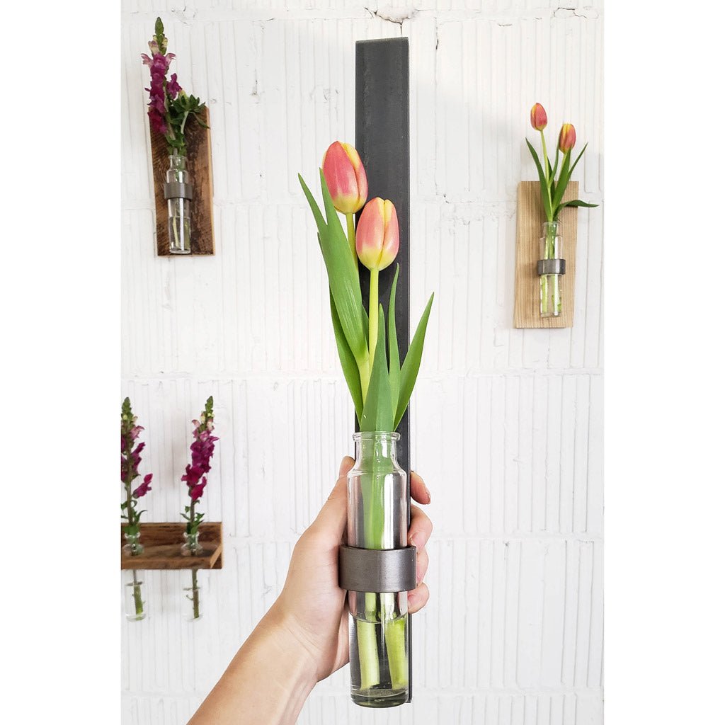 Metal wall sconce for flowers and candles
