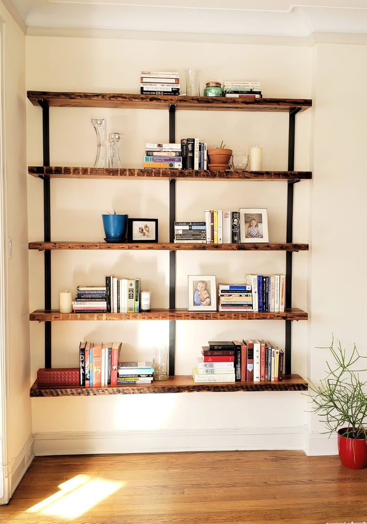 Large minimal heavy-duty reclaimed pine floating wall-mounted shelving unit with steel brackets. 