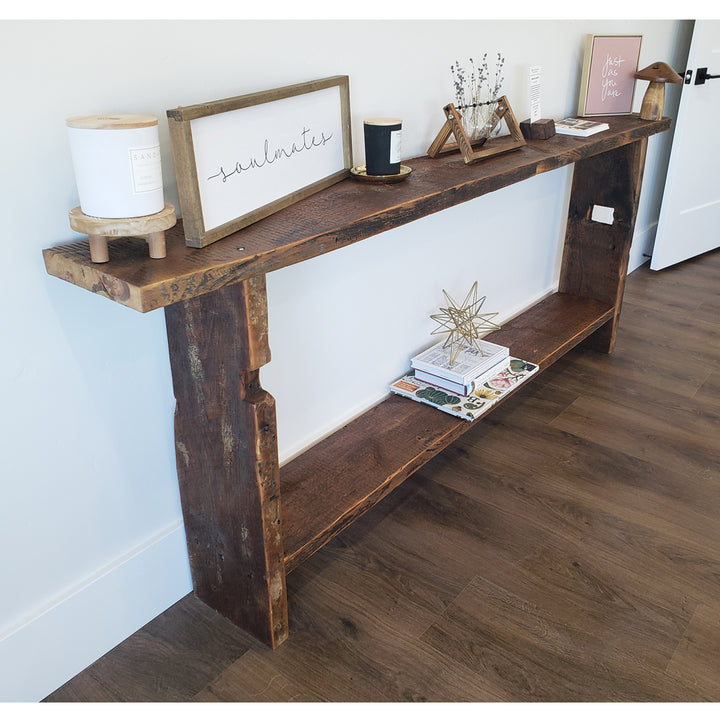 solid reclaimed wood console table. long narrow table on white wall