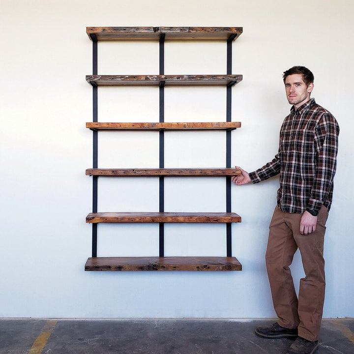 Custom floating shelving unit with reclaimed wood and black brackets, handcrafted in the usa. 