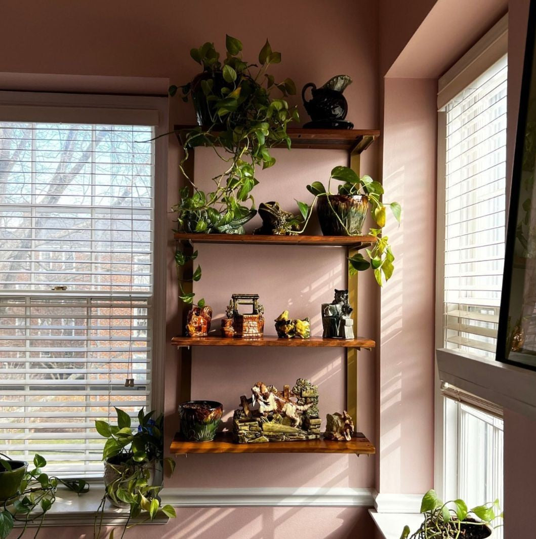 heavy duty wall mounted bookshelves that feature solid hardwood and brass steel brackets. 4 floating shelves. 