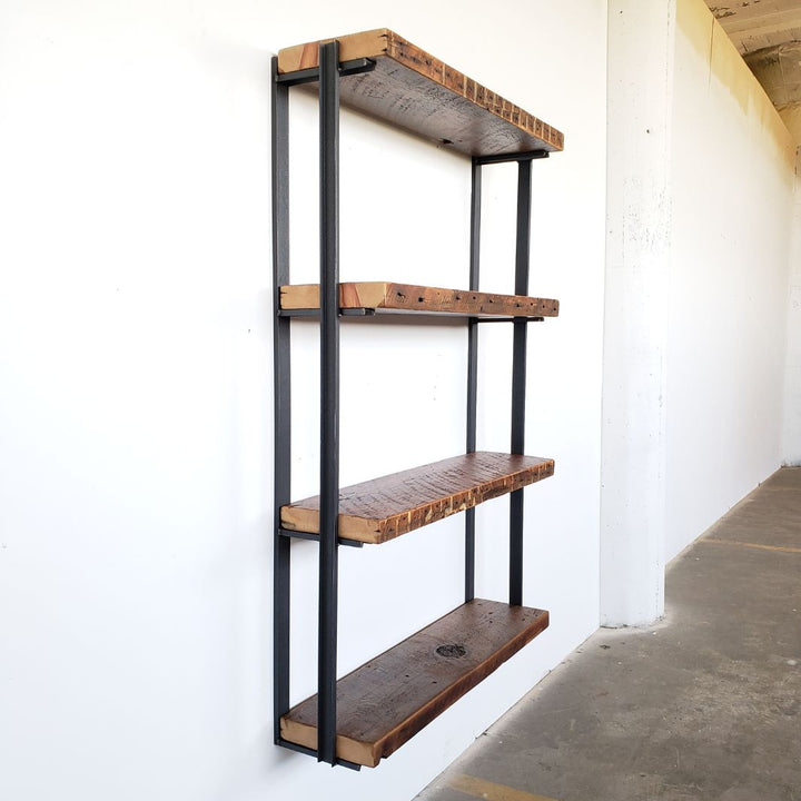 heavy duty solid reclaimed pine wood shelves and black bookend brackets offer industrial bookshelves. 