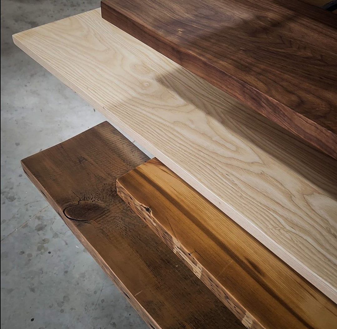 Close-up of solid wood with different finishes used for heavy duty floating shelves. 