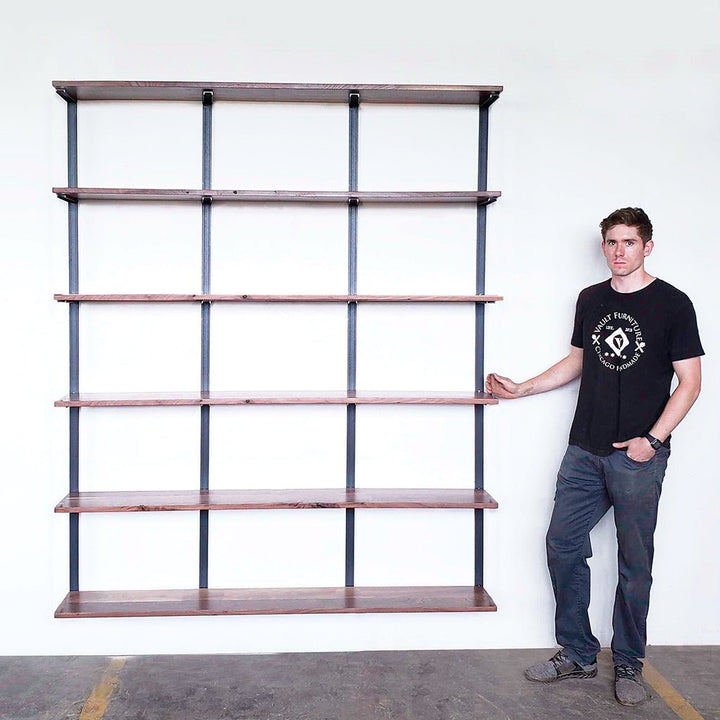 Large modern bookshelf wall mounted steel brackets and black walnut shelves by Vault Furniture