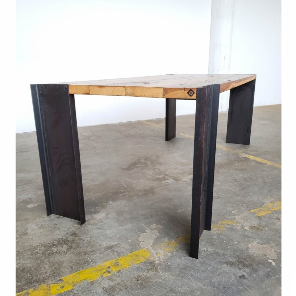 Modern industrial reclaimed pine dining table with steel legs. 