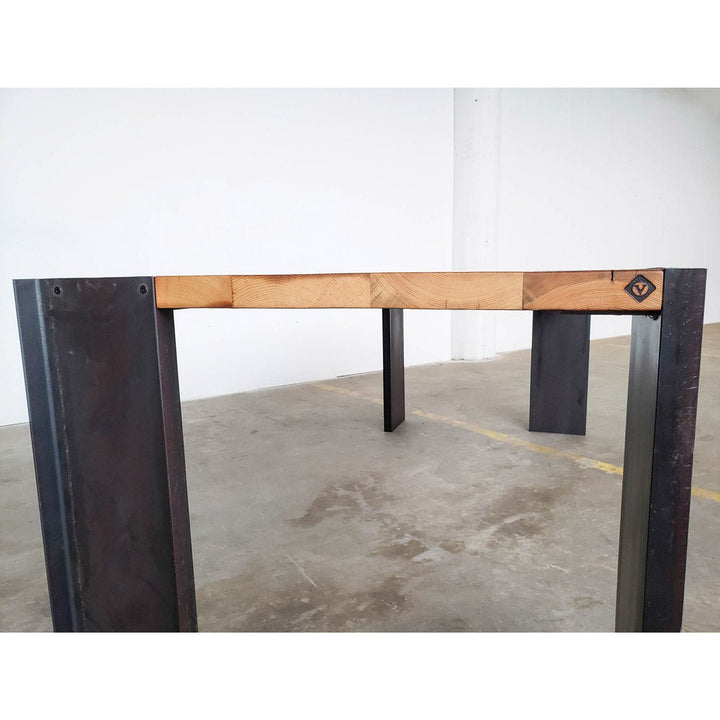 Modern dining table hand-made in USA by Vault Furniture