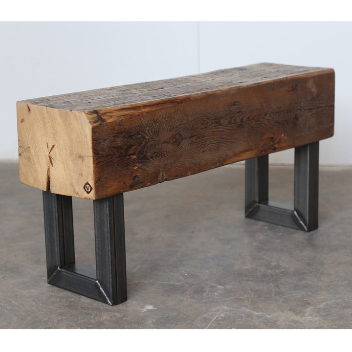 Narrow entryway bench hand-made from reclaimed beam and metal legs. 
