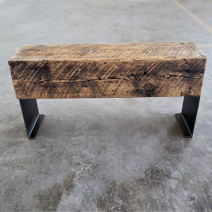 Industrial modern reclaimed beam bench with steel channel legs.